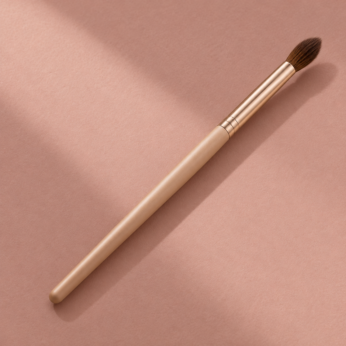 Tapered Crease Brush — reverse-angle view on dusty rose