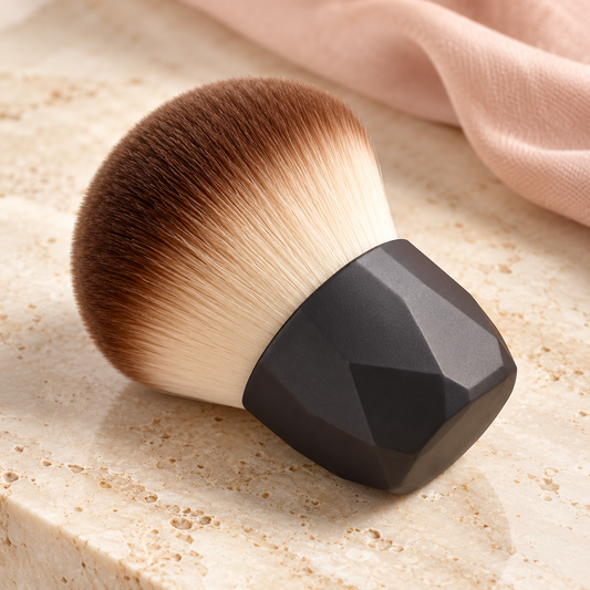 Palm Grip Kabuki Brush on a styled vanity